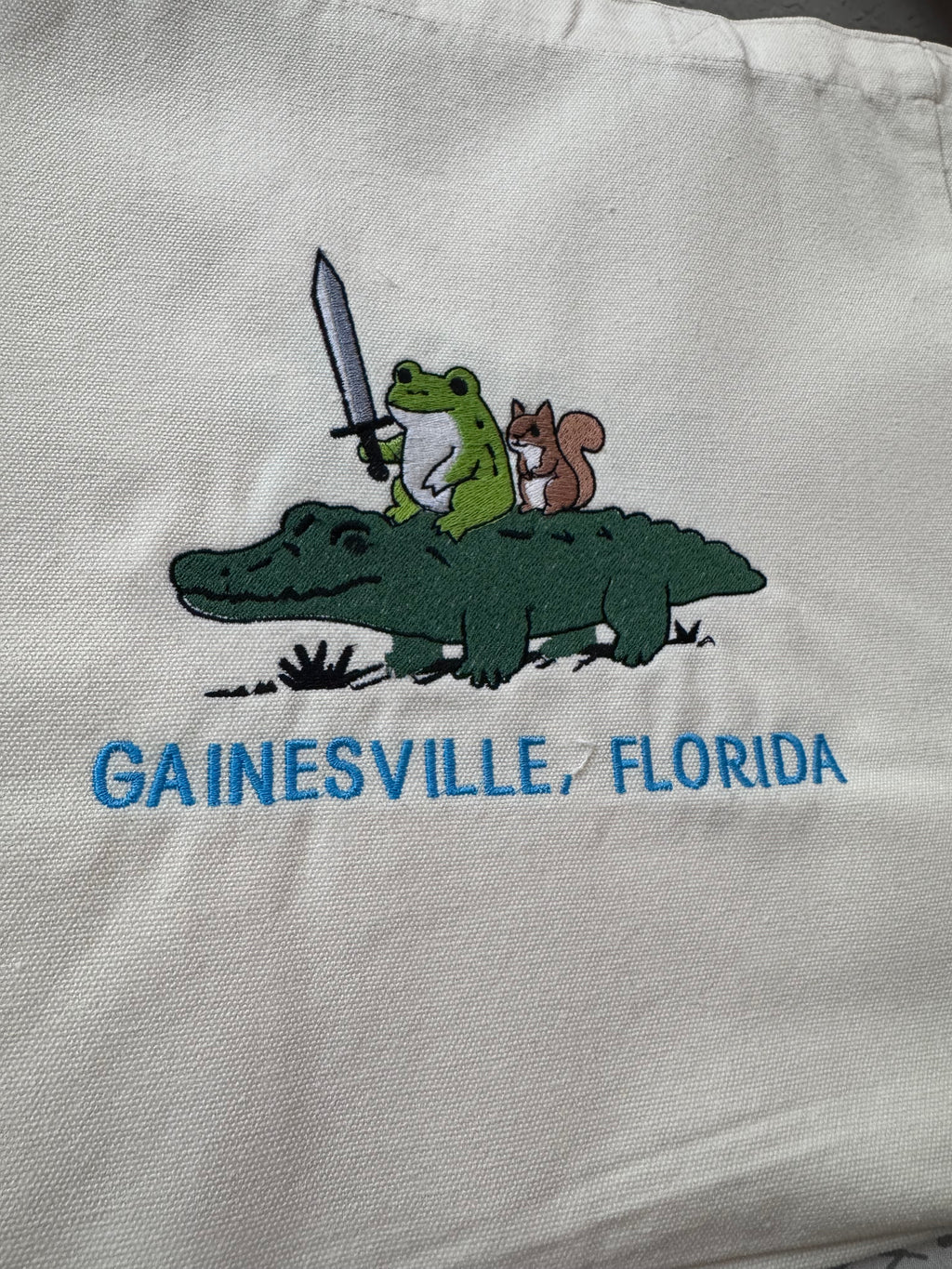 Toad and Squirrel riding a Gator.
